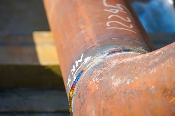 Welded butt joints of the Du150 pipeline from refractory steel, welded by manual arc welding without subsequent heat treatment. Gas pipe.