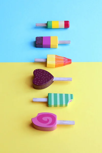 Colorful ice cream with wooden sticks — Stock Photo, Image
