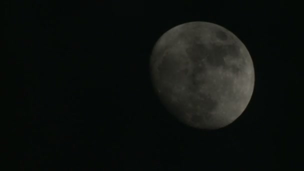 Shooting of waning moon in night sky — Stock Video