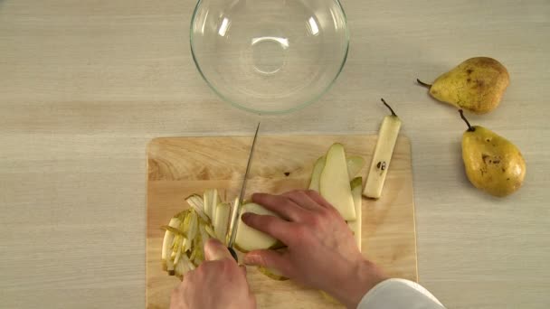 Process of pear slicing view from above — Stock Video