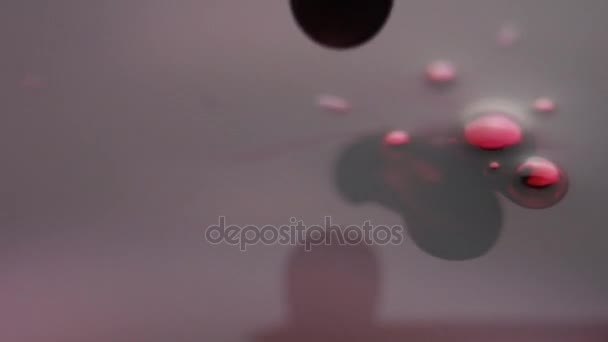 Close-up macro van druppel bloed is gedaald in het water — Stockvideo