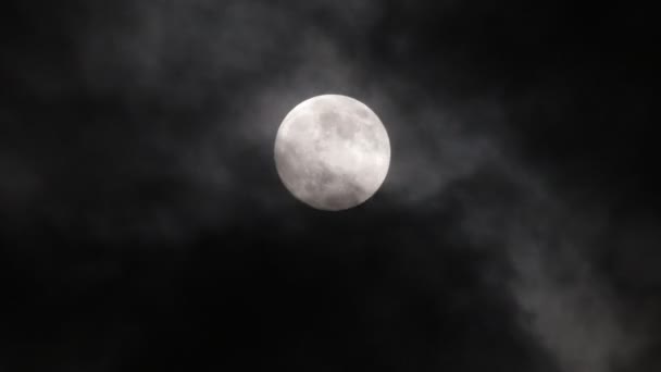 Timelapse with moon moving between clouds — Stock Video