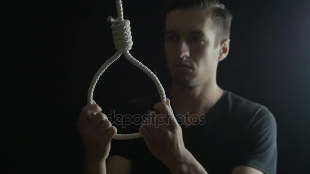 Suicide, depressed man, gallows noose around his neck — Stock Video