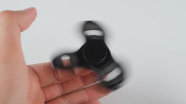 Değer değişimi ya da fidgeting el oyuncak üzerinde dönen el mans