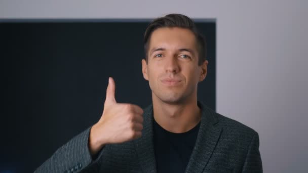 Approval Concept. Handsome Businessman showing Thumbs Up. Young man in classical clothes giving thumb up successful thumb up yes ok concept — Stock Video