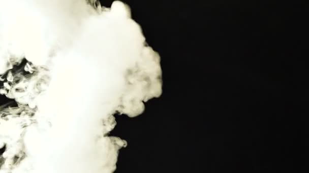 Realistic Smoke Clouds Fog flies through the frame. Good footage for effects and transitions. Smoke cloud on black isolated background — Stock Video