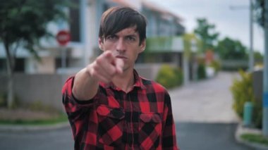 Pointing At The Camera With The Finger By Serious Man