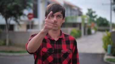 Pointing At The Camera With The Finger By Serious Man
