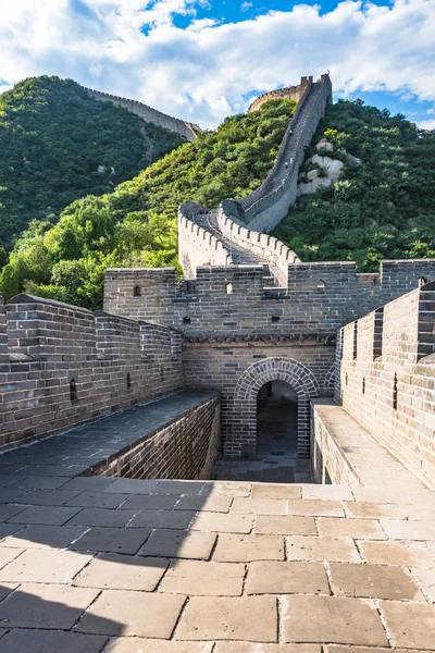 The Great Wall of China is a series of fortifications made of stone, brick, tamped earth, wood, and other materials, generally built along an east-to-west line across the historical northern borders of China to protect the Chinese states and empires