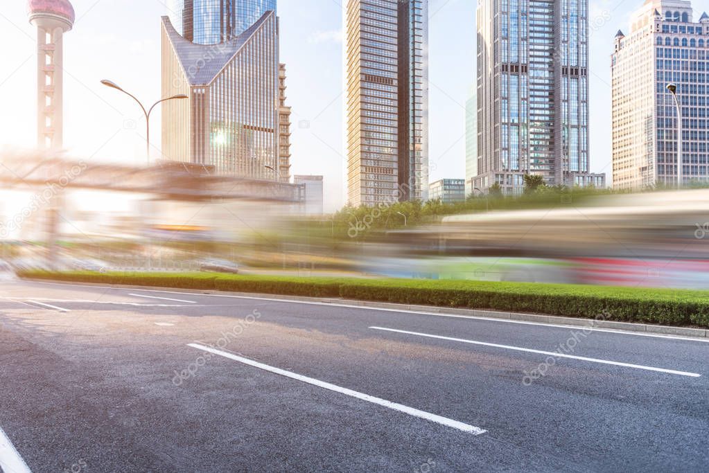 empty asphalt road through modern city in China.