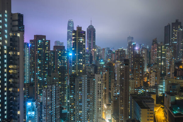 Illuminated financial district in Hong Kong,China.