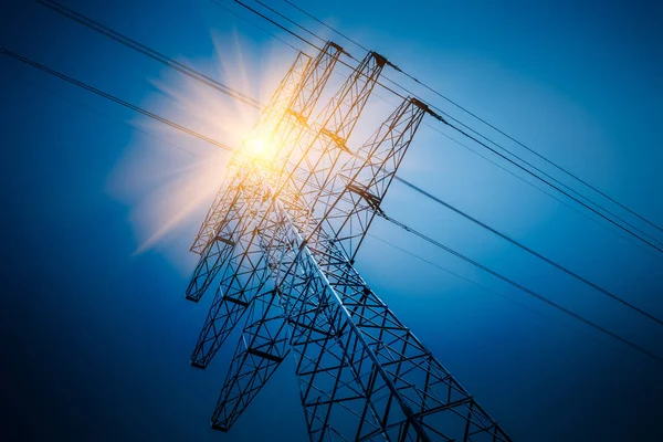 High voltage tower isolated on blue sky