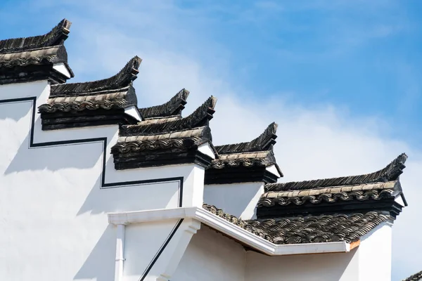 Roof of historic building against blue sky — Stock Photo, Image