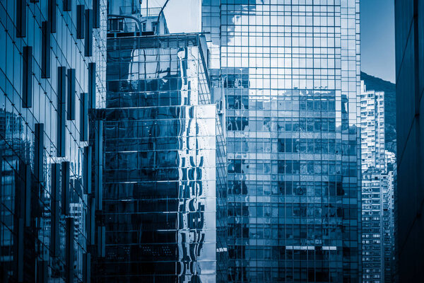 Detail shot of modern architecture facade,business concepts in blue tone,shot in city of China.