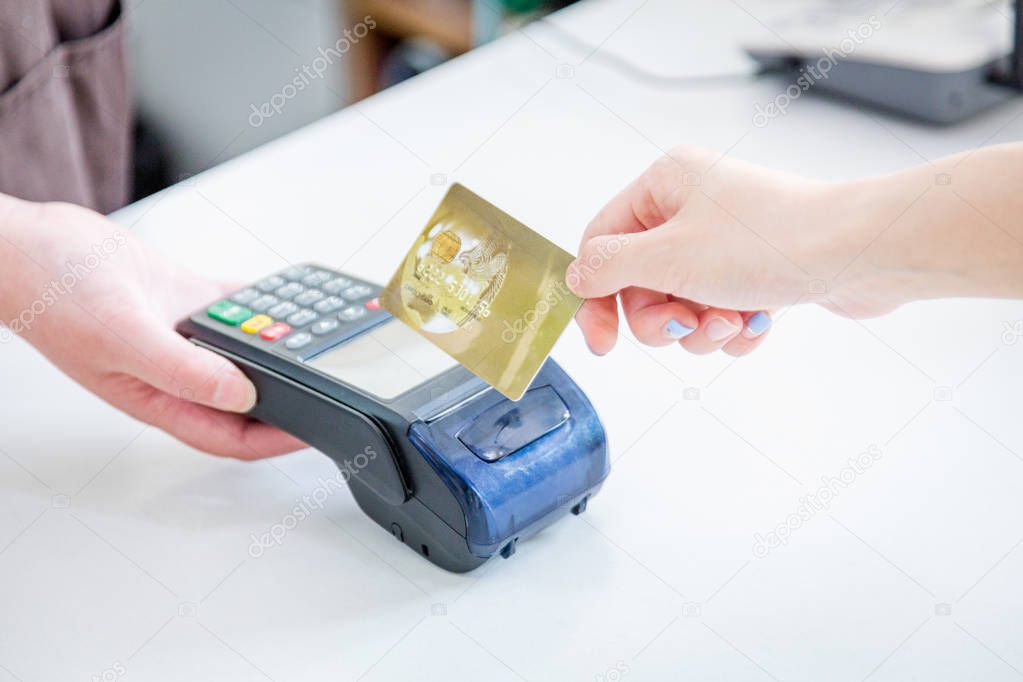 Card payment with chip and pin machine in shop