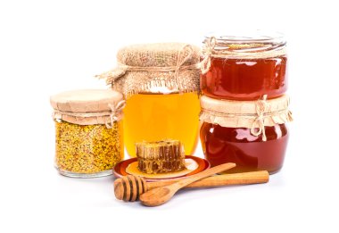 Tatlım, petek, polen ve propolis bir beyaz ile natürmort