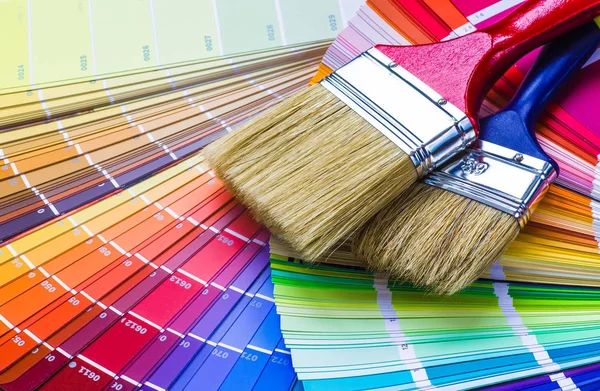 Painter and decorator work table with house project, color swatc — Stock Photo, Image