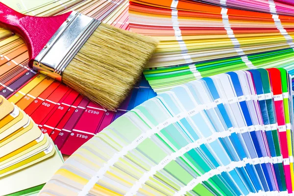 Painter and decorator work table with house project, color swatc — Stock Photo, Image