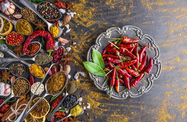 Various spices spoons on stone table. Top view . — Stock Photo, Image