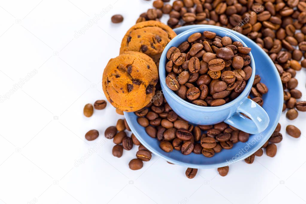 A coffee mug of coffee beans