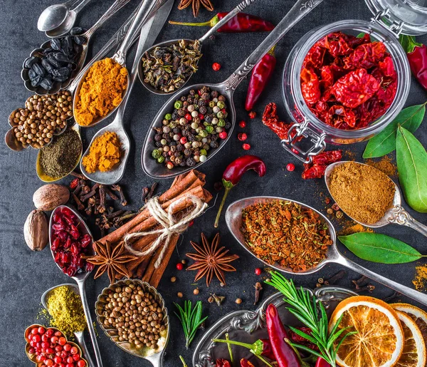 Spices and herbs in metal bowls. Food and cuisine ingredients. C — Stock Photo, Image