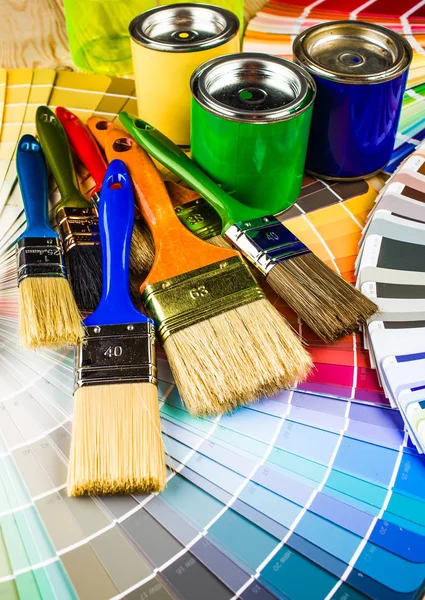 Painter and decorator work table with house project, color swatc — Stock Photo, Image