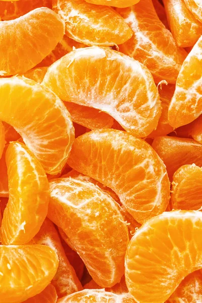 Segmentos de mandarina, textura de fondo naranja, posición plana, vista superior —  Fotos de Stock