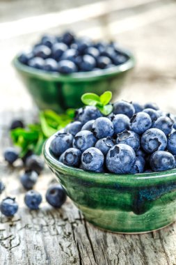 Metin için kopya alanı ile taze yaban mersini arka plan. Mavi