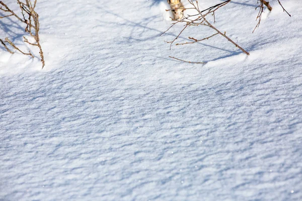 Sneeuwoppervlak als achtergrond of textuur. — Stockfoto