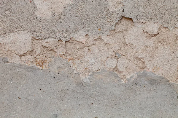 Eski kasabadaki terk edilmiş eski gri duvar