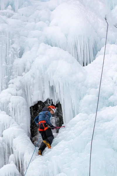 Training athletes at the winter ice climbing wall. — 스톡 사진