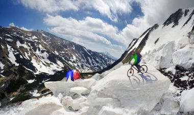 Extreme cyclist and mountain biking in the icefall clipart