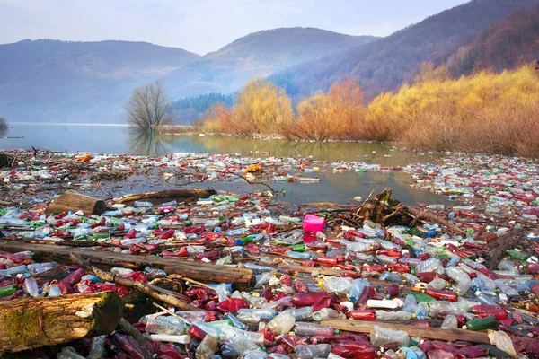 Bottles in the reservoir mountain — Stock Photo, Image