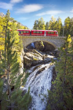 Railway bridge over the waterfall clipart