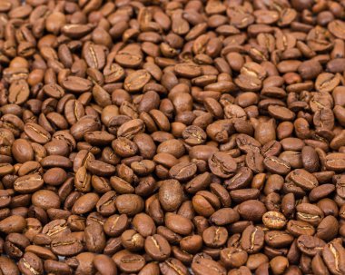 Kahve doku. kahve çekirdekleri arka plan duvar kağıdı olarak. Arabica kahve fasulye