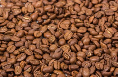 Kahve doku. kahve çekirdekleri arka plan duvar kağıdı olarak. Arabica kahve fasulye