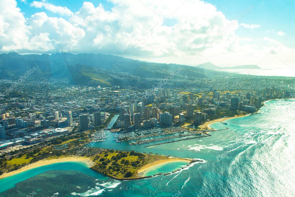 Beautiful aerial view on the island of Oahu, Honolulu city on Hawaii from the sea plane.