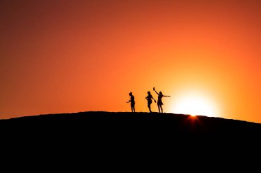 insanlar siluet Maspalomas tepeleri üst 