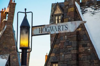 The intersection of Hogwarts and Hogsmeade in Wizarding World at Universal Island of Adventure in Orlando. clipart