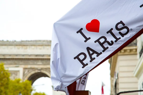 I love Paris sign with Arch of Triumph in the background