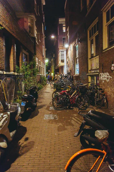 Bikes Parked Street Night Amsterdam Amazing Narrow City Street — Stock Photo, Image