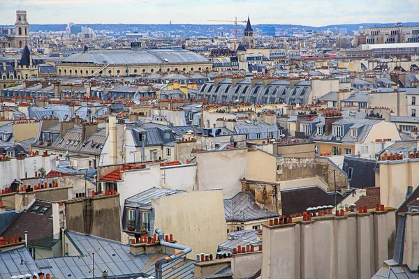 Aerial street view of Paris from above with the Montmartre church in the middle.