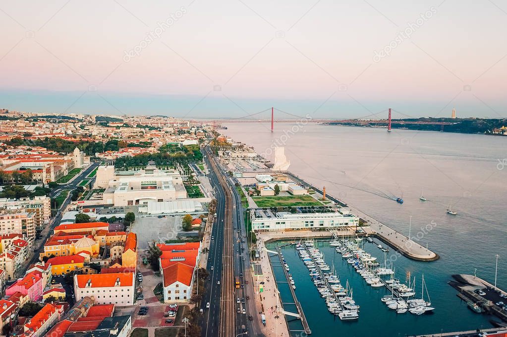 Beautiful aerial Lisbon view with the sea, bridge and the old town of Lisbon.