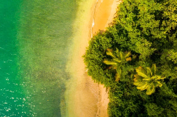 Empty paradise beach, blue sea waves in island. Beautiful tropical island. Holiday and vacation concept.