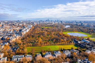 Beautiful aerial panoramic view of the Hyde park in London from above with a beautiful view of trees park and small ponds.