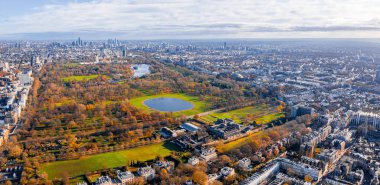Beautiful aerial panoramic view of the Hyde park in London from above with a beautiful view of trees park and small ponds.