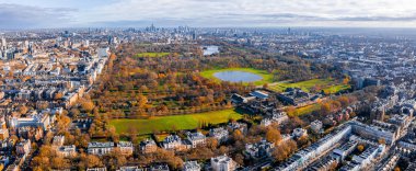 Beautiful aerial panoramic view of the Hyde park in London from above with a beautiful view of trees park and small ponds.