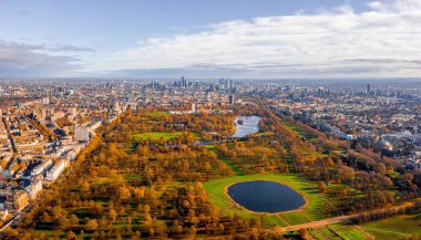 Beautiful aerial panoramic view of the Hyde park in London from above with a beautiful view of trees park and small ponds.