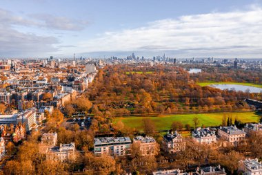 Beautiful aerial panoramic view of the Hyde park in London from above with a beautiful view of trees park and small ponds.