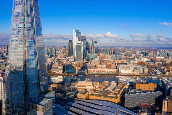 Stunning London view from above. London city district, Tower Bridge and river Thames. Magical England panorama.